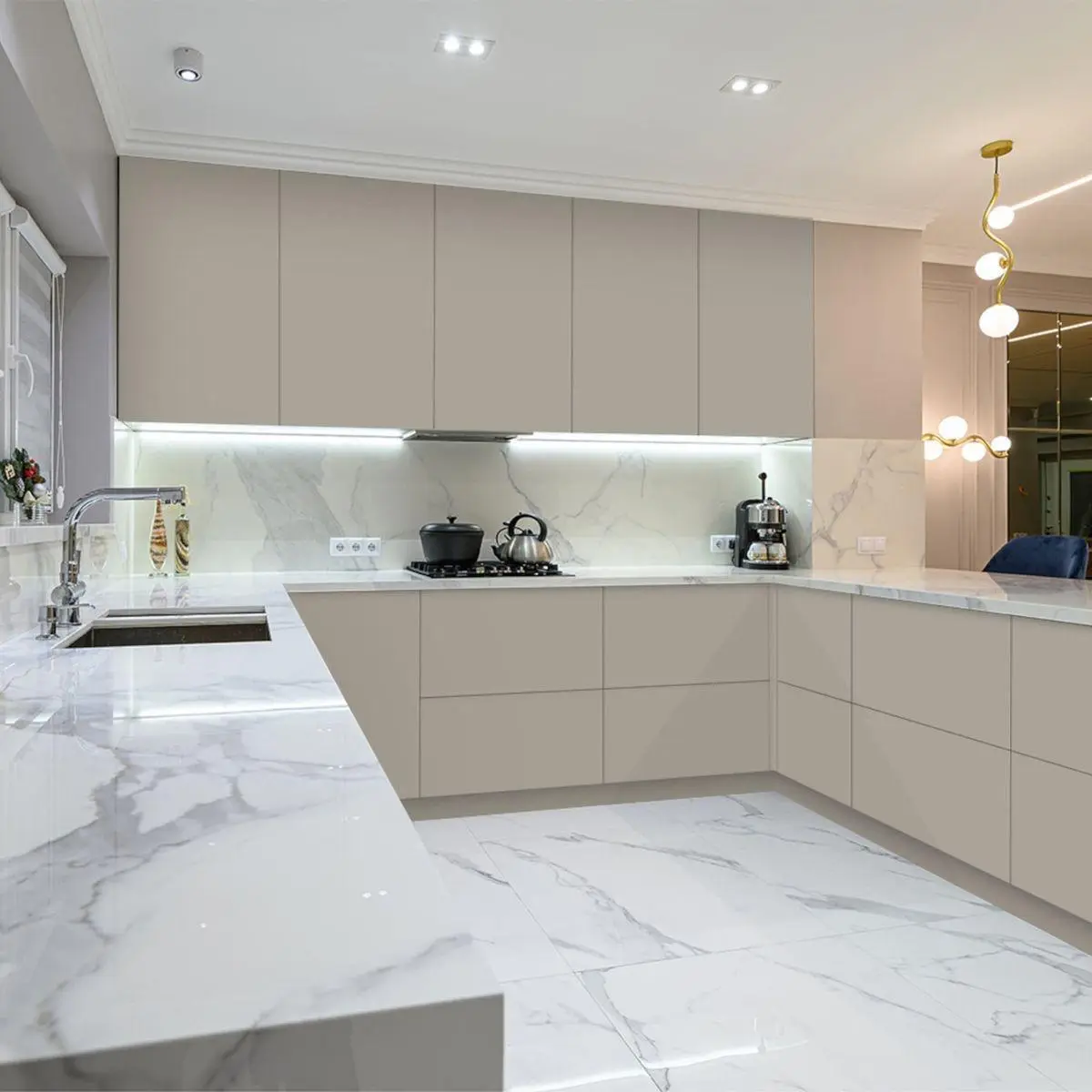 Handleless taupe kitchen cabinetry