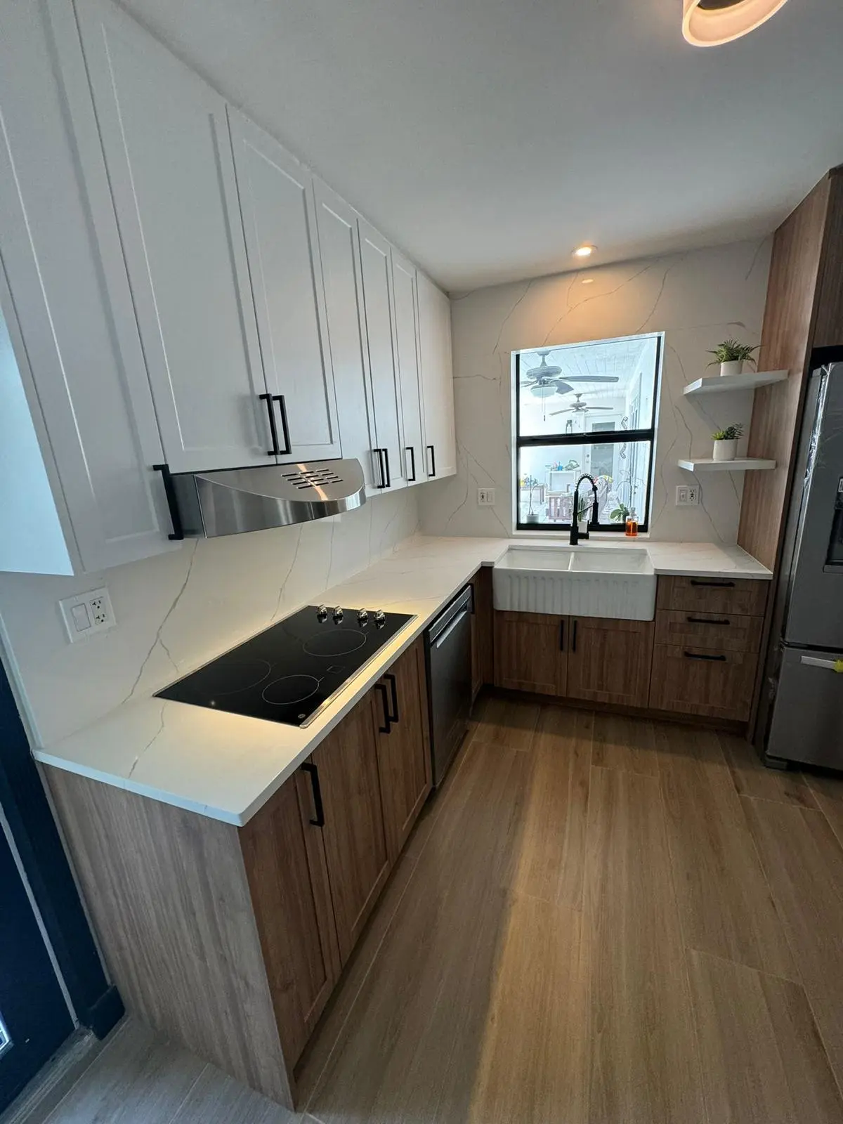 Two-tone compact galley kitchen